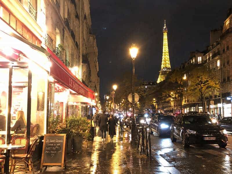 Rainy Paris Street with Eiffel Tower Glow